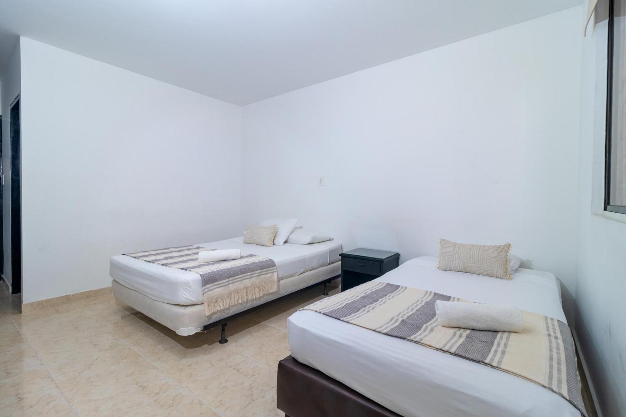Hotel Axis Inn By Geh Suites ซันตามาร์ตา ภายนอก รูปภาพ
