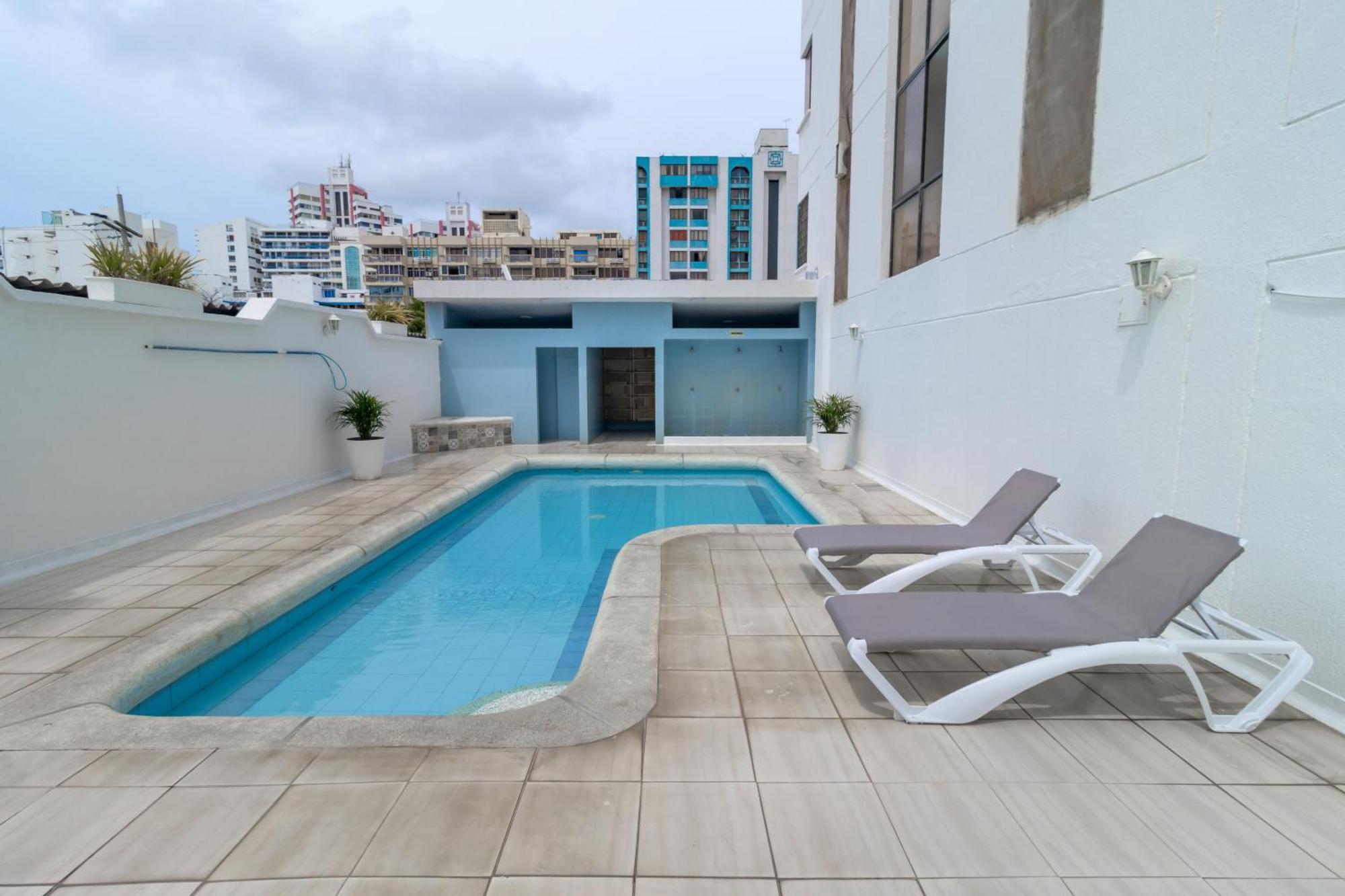Hotel Axis Inn By Geh Suites ซันตามาร์ตา ภายนอก รูปภาพ